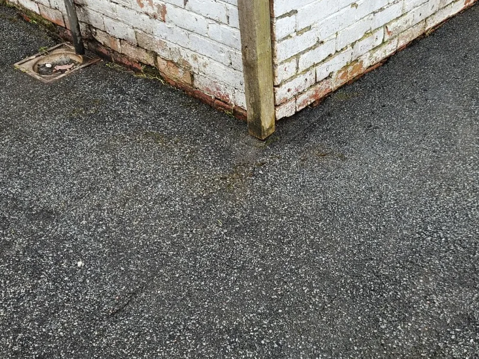Driveway corner clean after OCD Services work