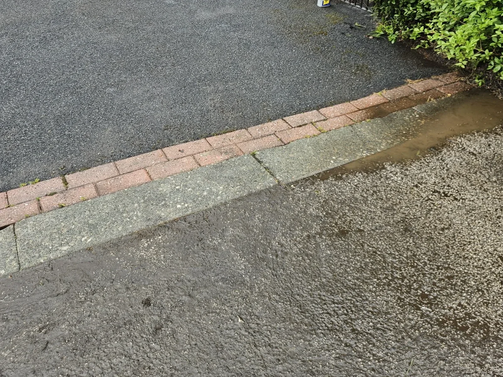 Driveway edge clean after OCD Services work