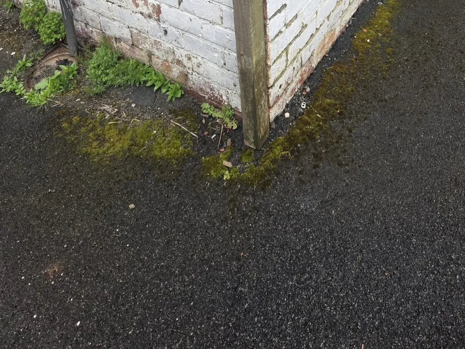 Driveway corner clean before OCD Services work